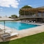 Ozadi Tavira Hotel