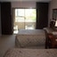Rime Garden Inn & Suites