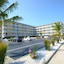 Coastal Palms Inn & Suites